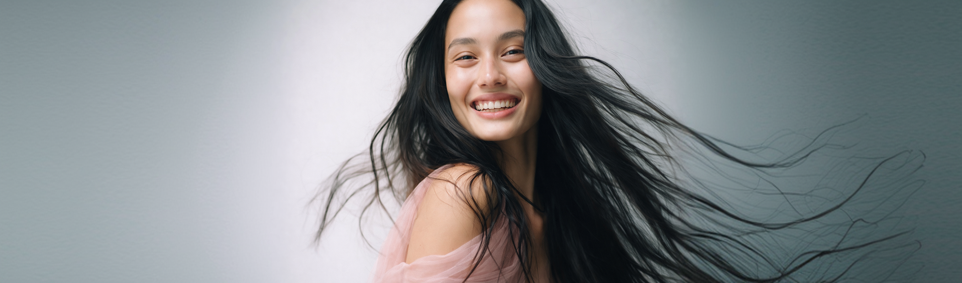 Three women with healthy skin and hair smiling together
